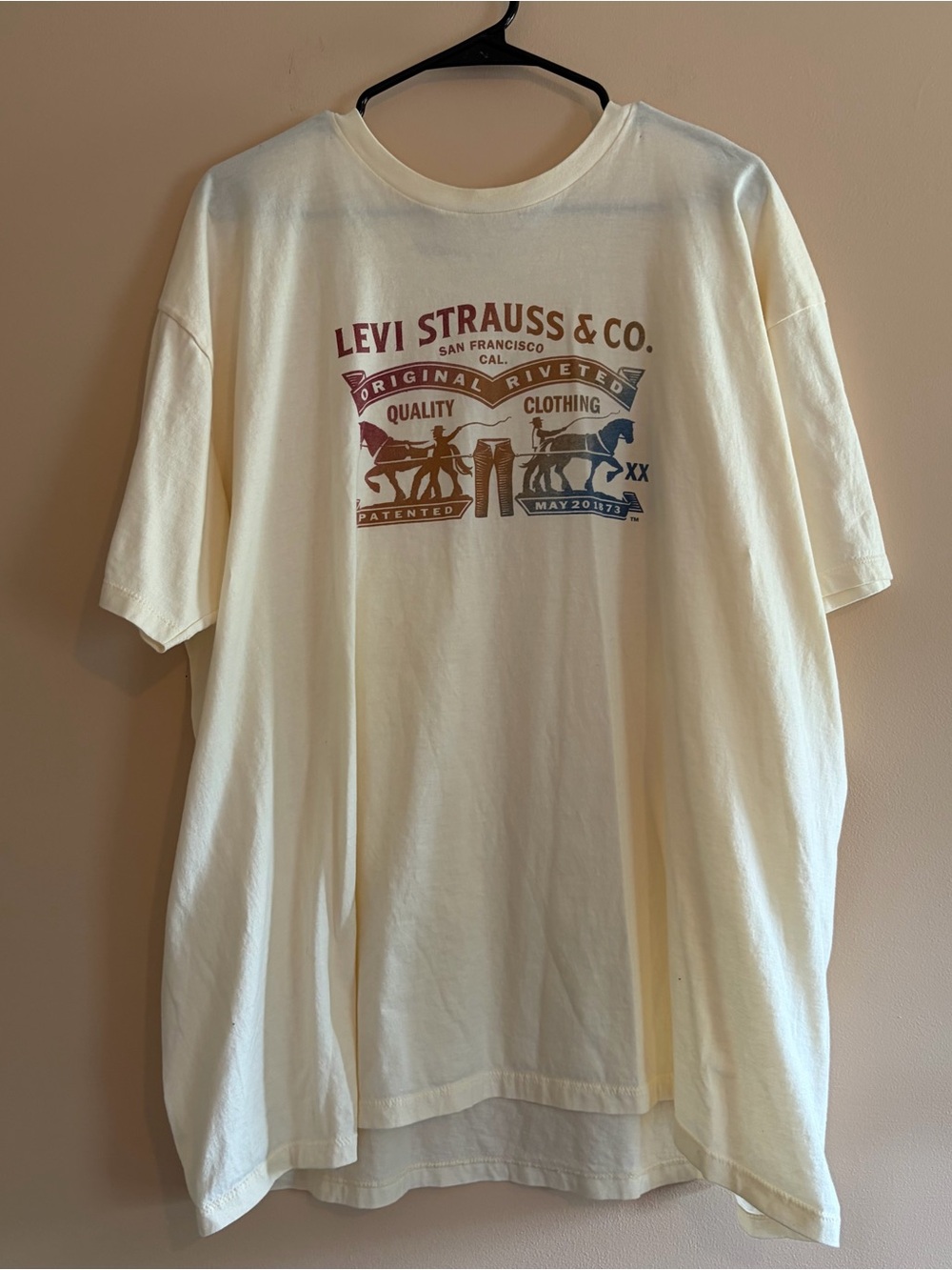 Levi's Cream Tee with Multicolor Riveted Graphic